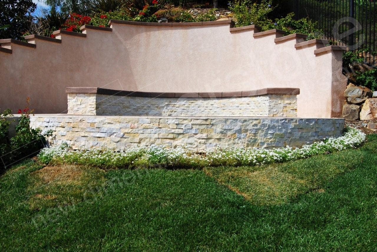 Stacked Stone Veneer panels used on the curved walls of a raised spa